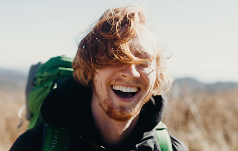 Laughing male hiker